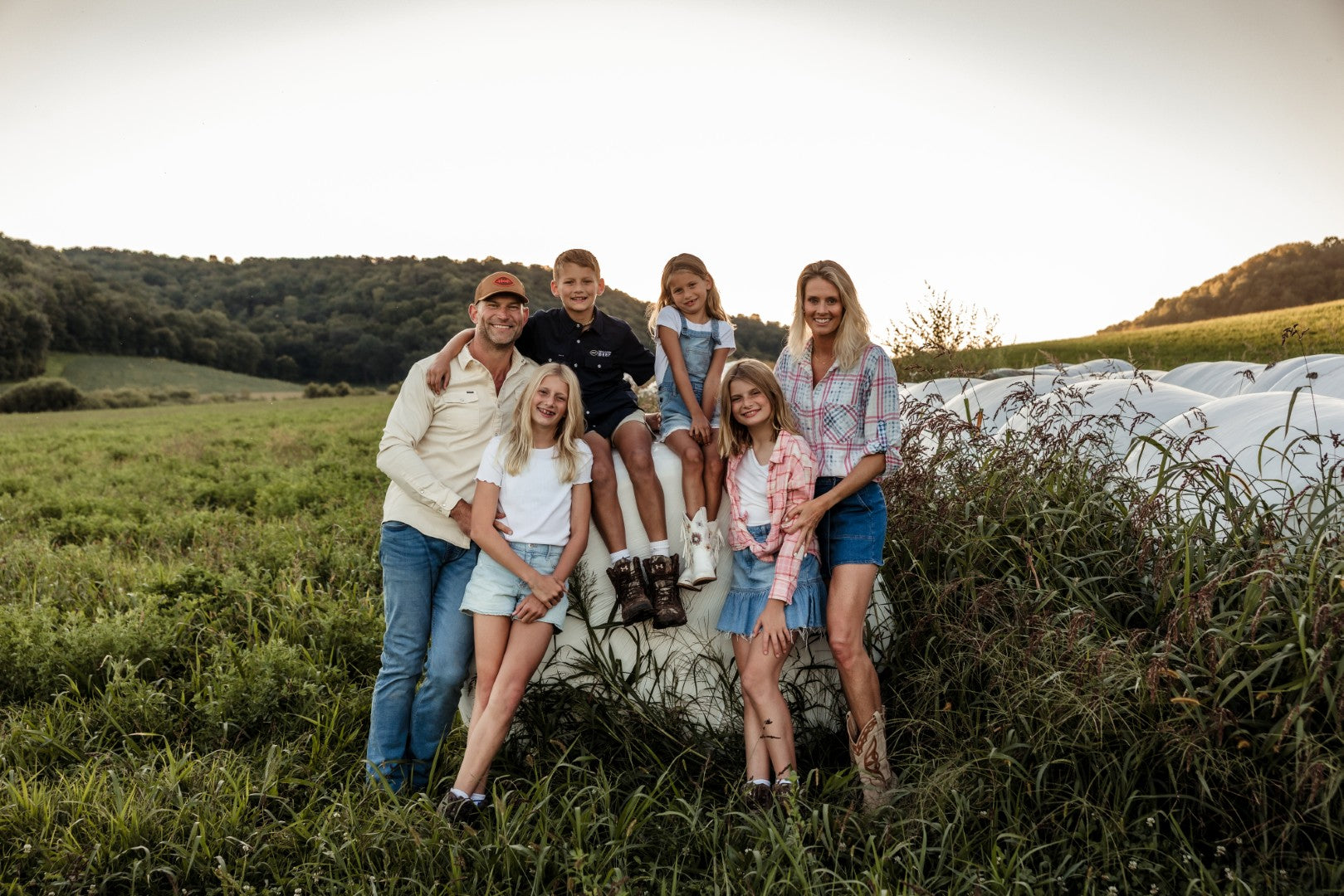 Joe and Annie Thomas with their children at the farm